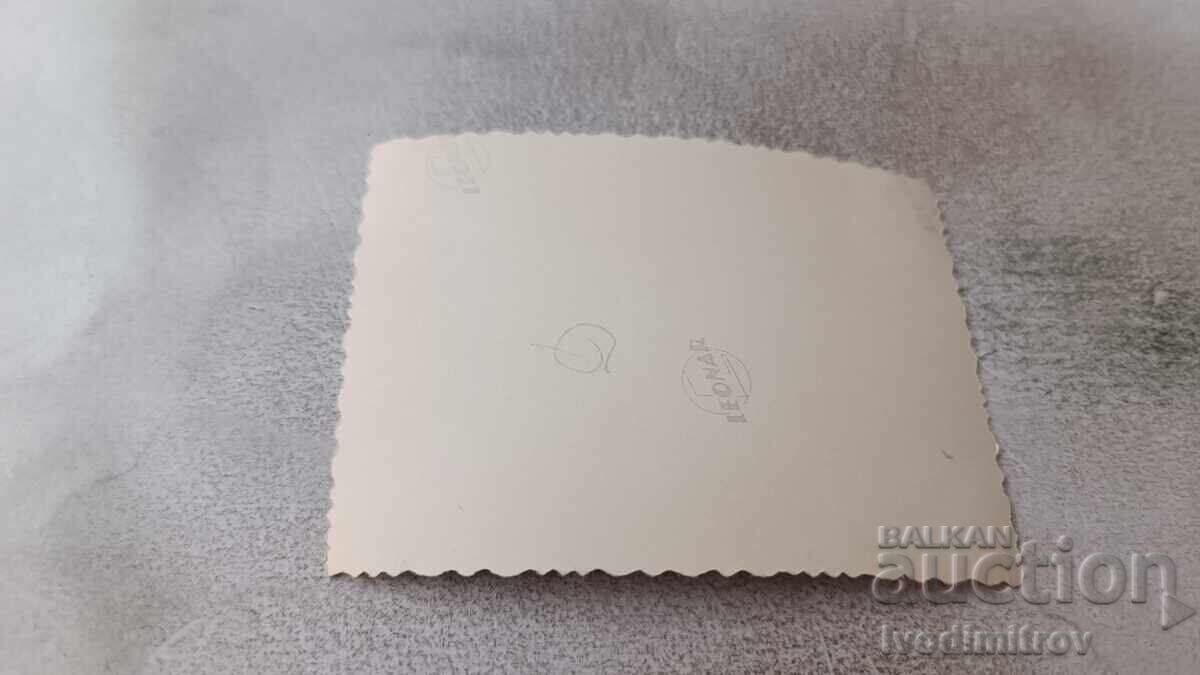 Снимка Момчета и момиче на улицата покрай камбанария с цена 1.85 лв. | € 0.95