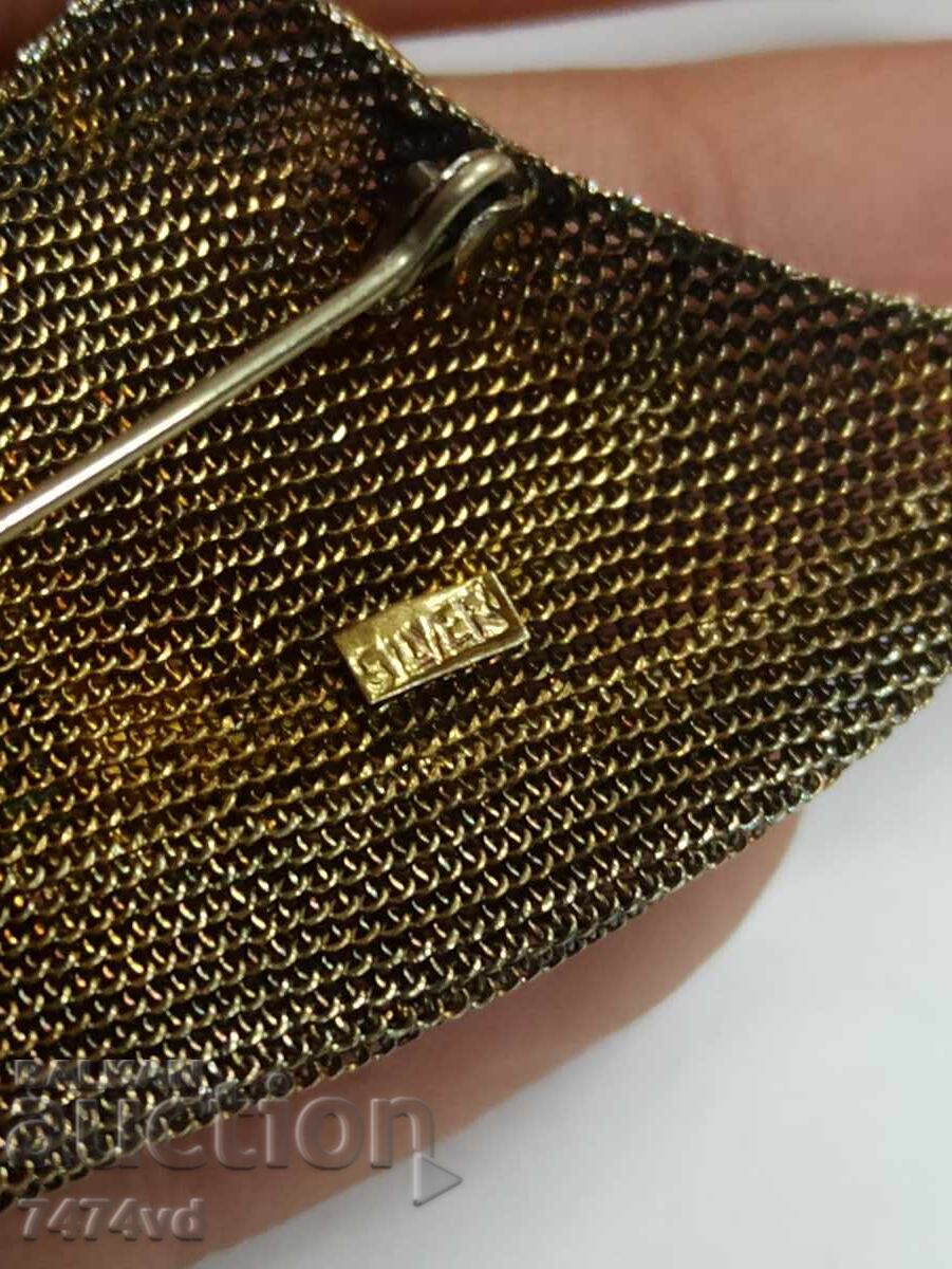 Auction Elegant antique silver brooch with gilding and enamel cap Auction Elegant antique silver brooch with gilding and enamel cap