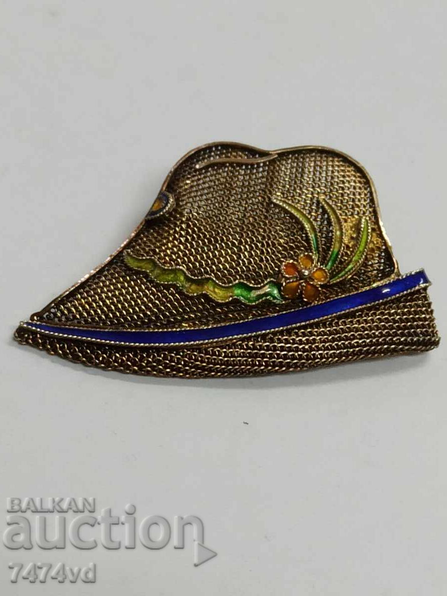 Elegant antique silver brooch with gilding and enamel cap Elegant antique silver brooch with gilding and enamel cap