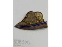 Elegant antique silver brooch with gilding and enamel cap