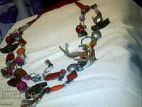 Old necklace with natural stones and silver