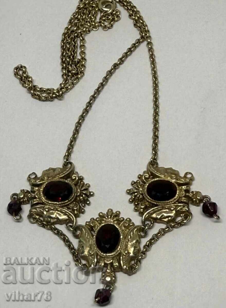 Old silver necklace with garnets and gilding with price 599.99 BGN | € 306.77 Old silver necklace with garnets and gilding with price 599.99 BGN | € 306.77