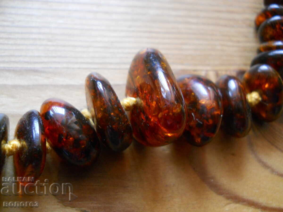 Antique Baltic amber necklace with a silver clasp with price 480.00 BGN | € 245.42 Antique Baltic amber necklace with a silver clasp with price 480.00 BGN | € 245.42