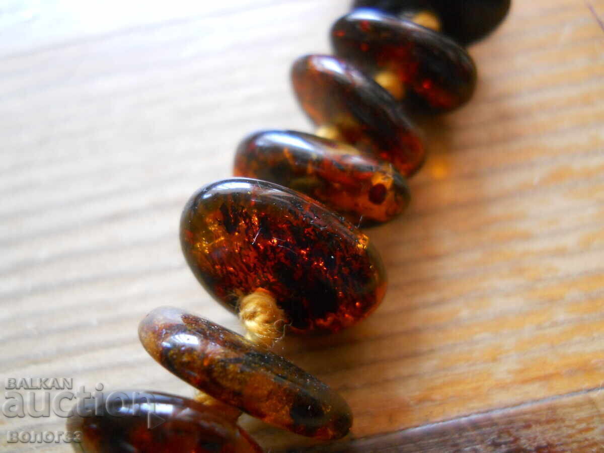 Delivery of Antique Baltic amber necklace with a silver clasp Delivery of Antique Baltic amber necklace with a silver clasp