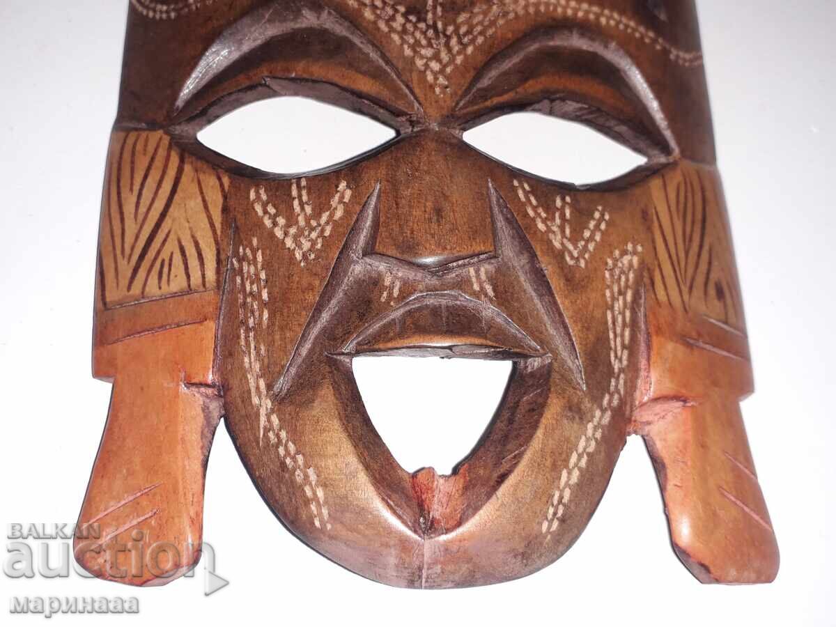 Delivery of OLD MASK. WOOD