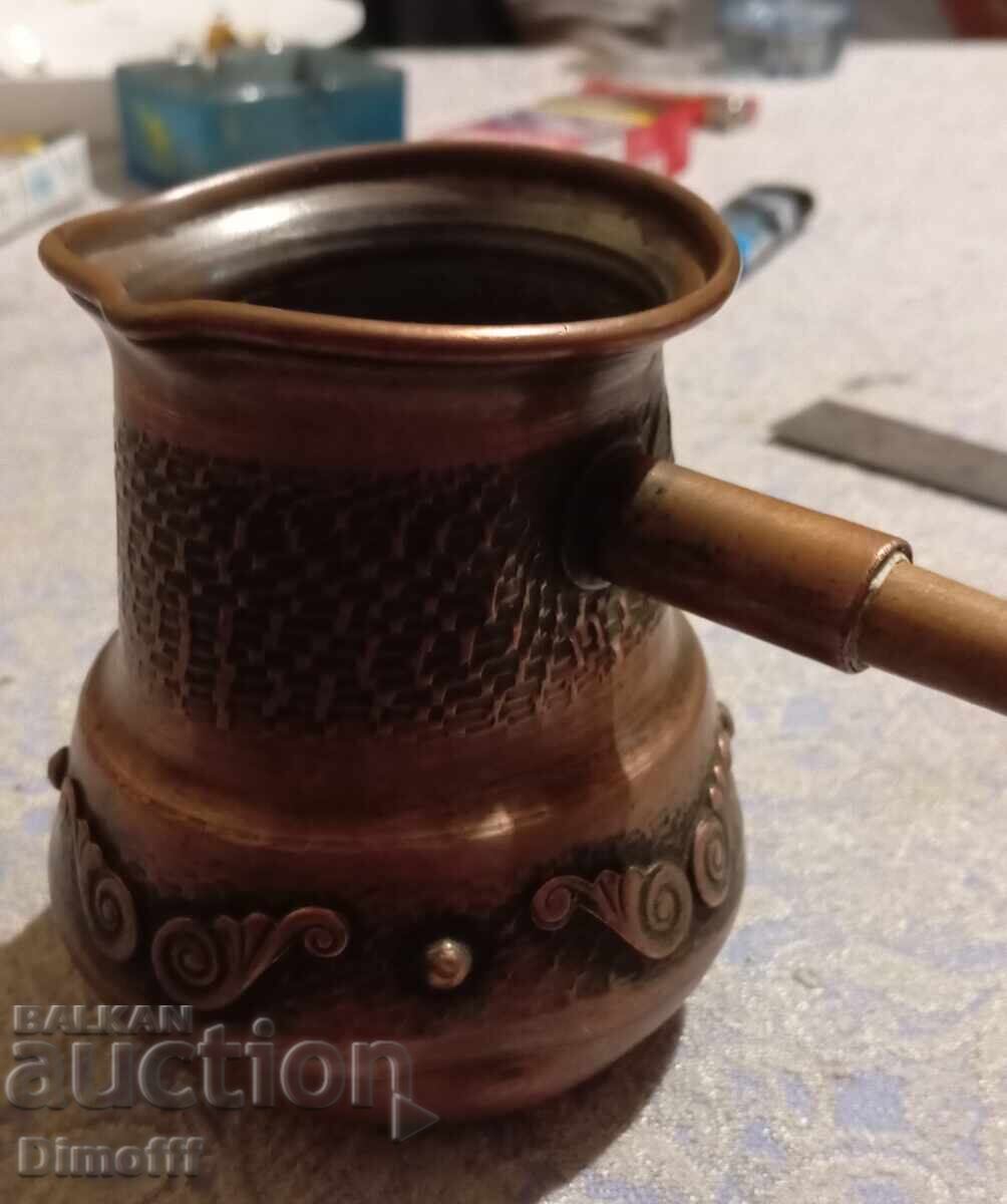 Copper cezve with a wooden handle Copper cezve with a wooden handle