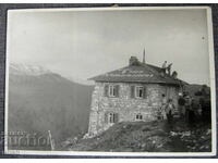 Old photograph of a mountain hut, hard photograph