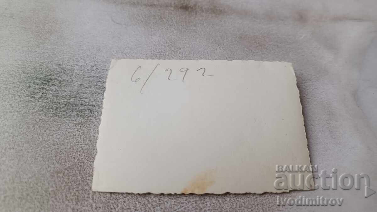 Photo Sofia Woman and two boys in front of a Sofia shop with price 3.45 BGN | € 1.76 Photo Sofia Woman and two boys in front of a Sofia shop with price 3.45 BGN | € 1.76