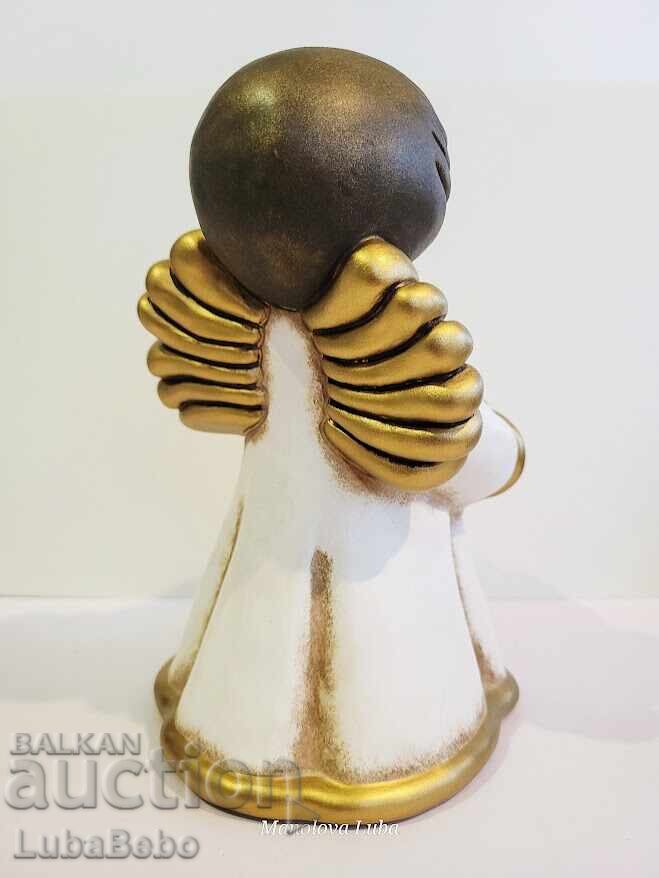 Аукцион Ангел Рози с поставка за свещ. Аукцион Ангел Рози с поставка за свещ.