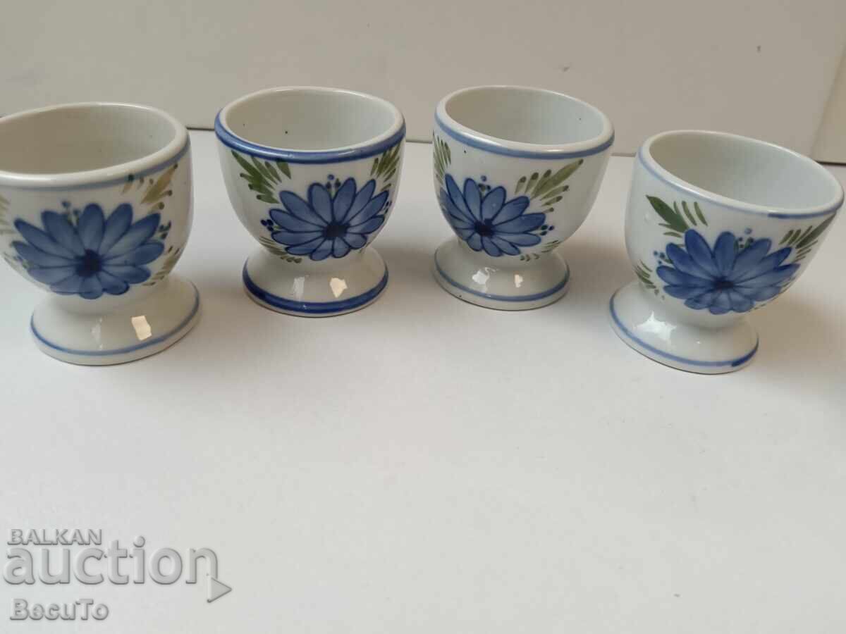 Delivery of Porcelain breakfast set with egg cups, salt shakers, and a container for Delivery of Porcelain breakfast set with egg cups, salt shakers, and a container for