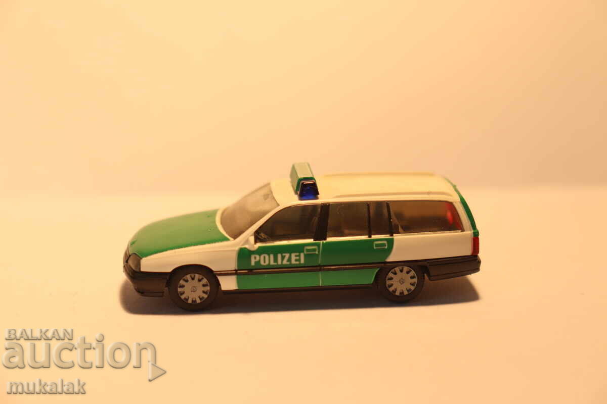 HERPA 1/87 H0 OPEL OMEGA POLICE POLICE CAR MODEL HERPA 1/87 H0 OPEL OMEGA POLICE POLICE CAR MODEL