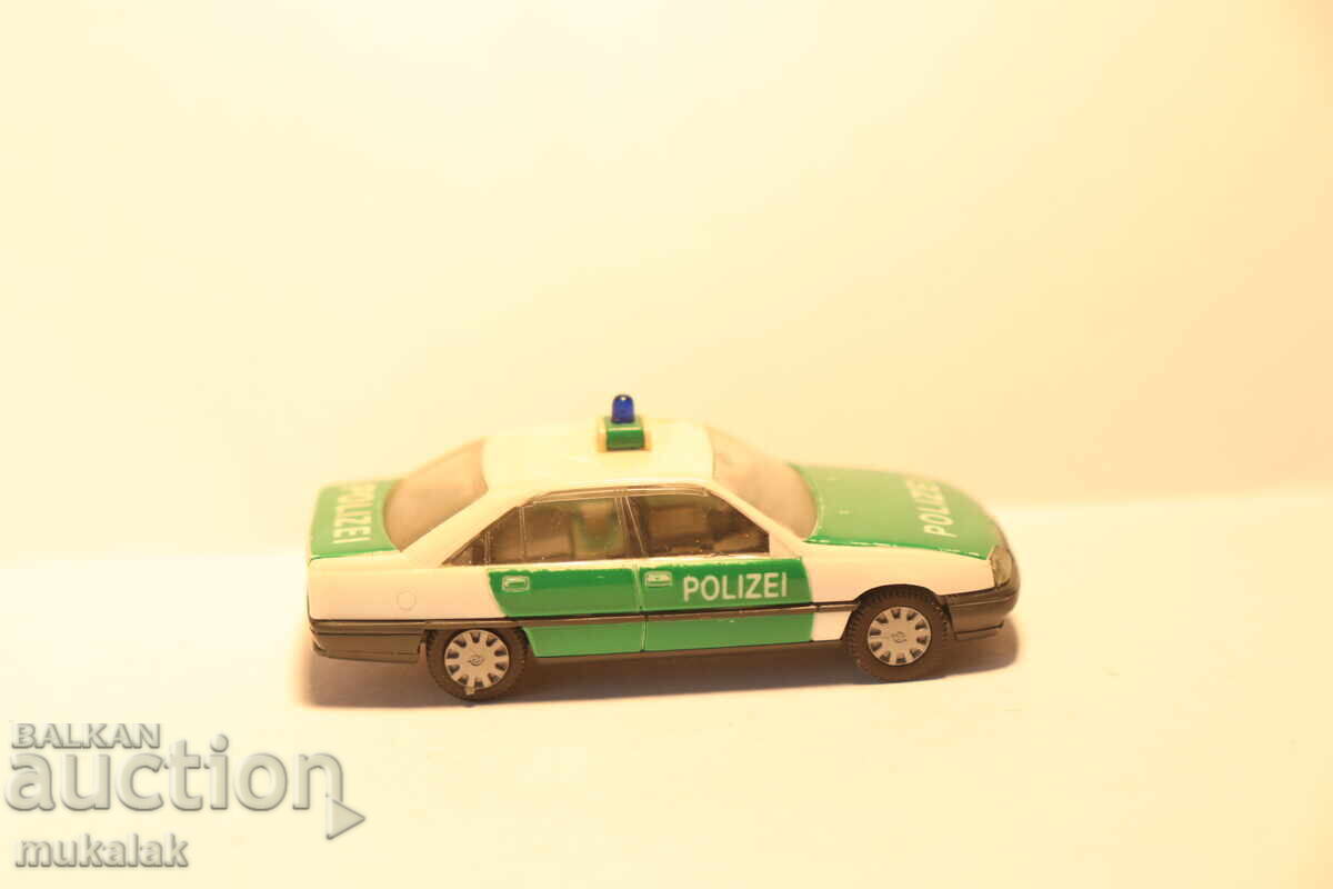 Delivery of HERPA 1/87 H0 OPEL OMEGA POLICE POLICE CAR MODEL Delivery of HERPA 1/87 H0 OPEL OMEGA POLICE POLICE CAR MODEL
