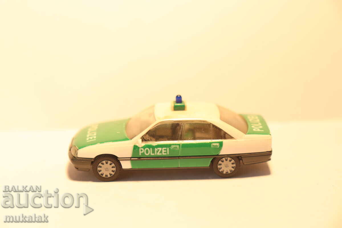 HERPA 1/87 H0 OPEL OMEGA POLICE POLICE CAR MODEL HERPA 1/87 H0 OPEL OMEGA POLICE POLICE CAR MODEL