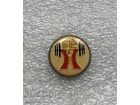 Znachka Ισπανικής Ομοσπονδίας Άρσης Βαρών