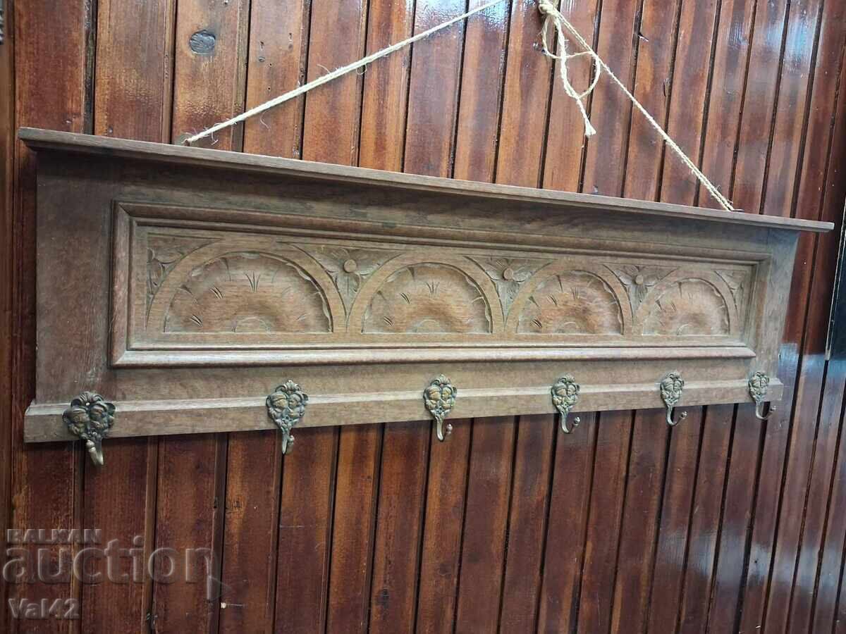 Auction Wooden wall hanger with carving and bronze hooks Auction Wooden wall hanger with carving and bronze hooks