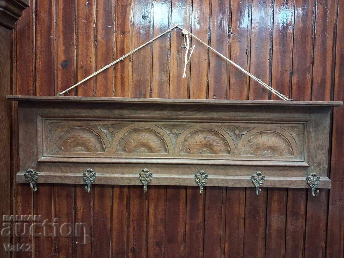 Wooden wall hanger with carving and bronze hooks Wooden wall hanger with carving and bronze hooks