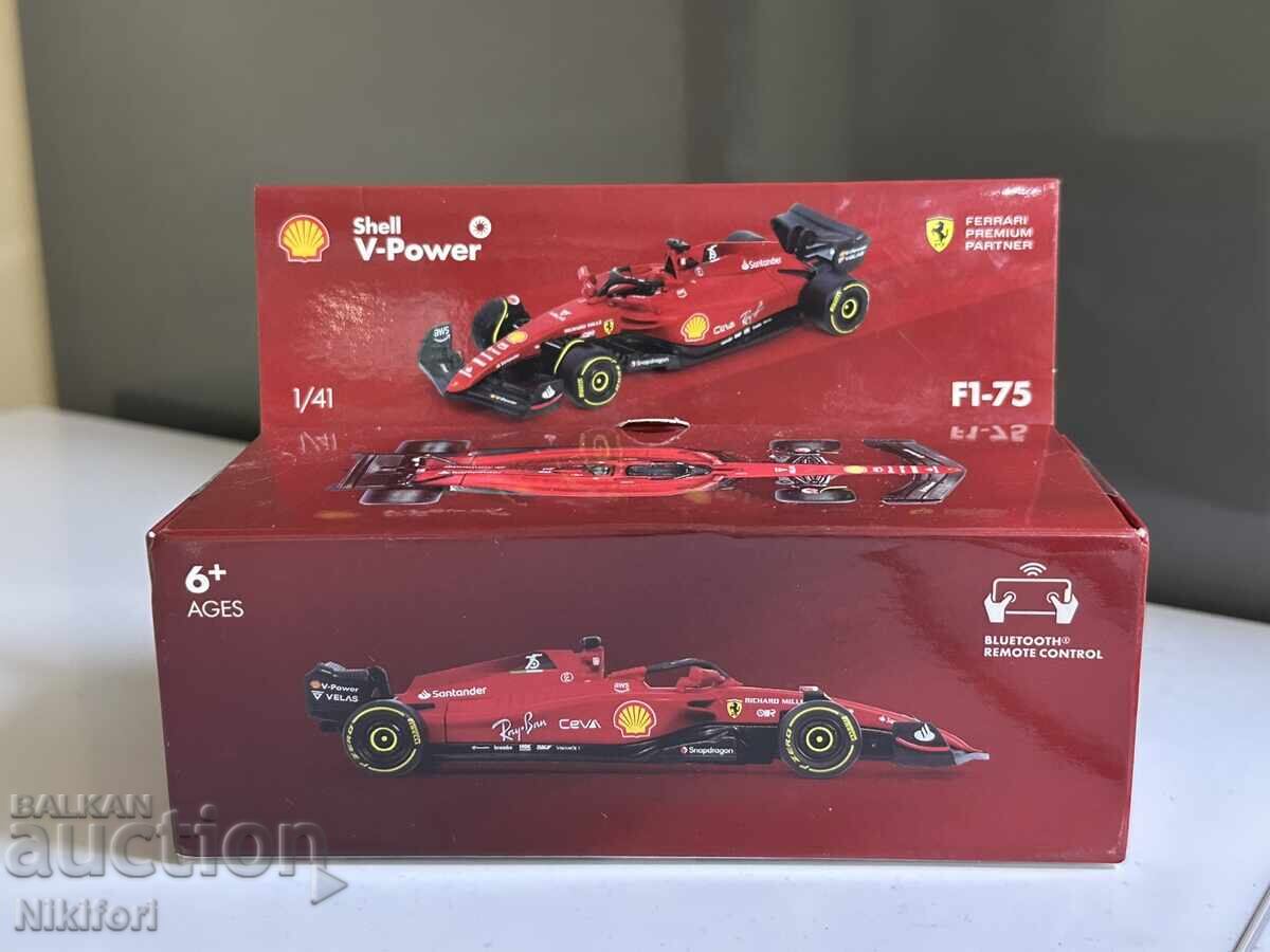 Cărucior Shell Ferrari F1 75 Burago 2023 Cărucior Shell Ferrari F1 75 Burago 2023