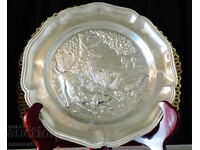 Kalayna plate with hunting scene, Dog stalking pheasant