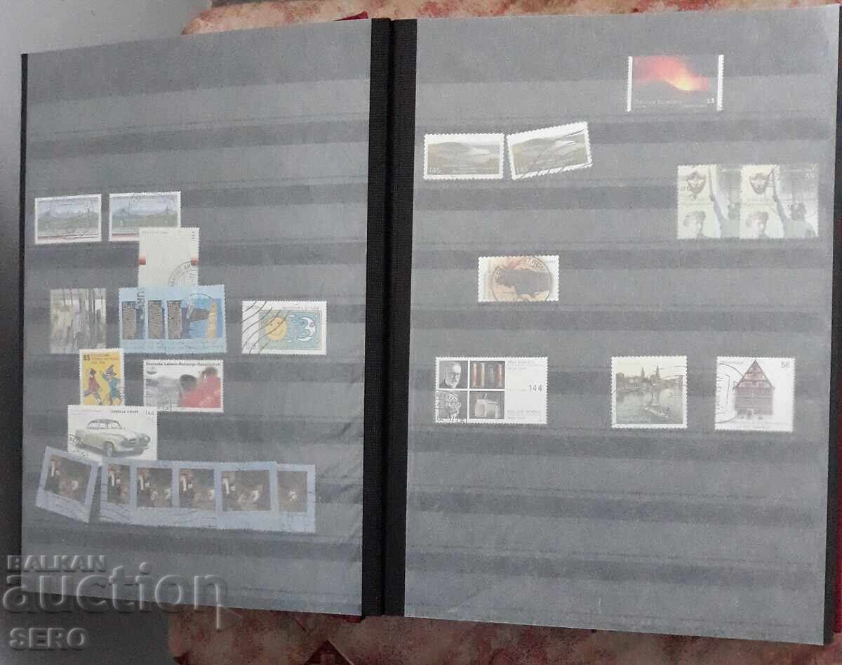 Filatelie - clasor frumos, cu 30 de file și circa 150 de timbre poștale cu preț 55.00 BGN | € 28.12 Filatelie - clasor frumos, cu 30 de file și circa 150 de timbre poștale cu preț 55.00 BGN | € 28.12