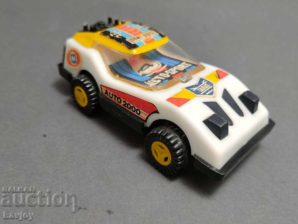 Доставка на Ретро играчка състезателен автомобил Доставка на Ретро играчка състезателен автомобил