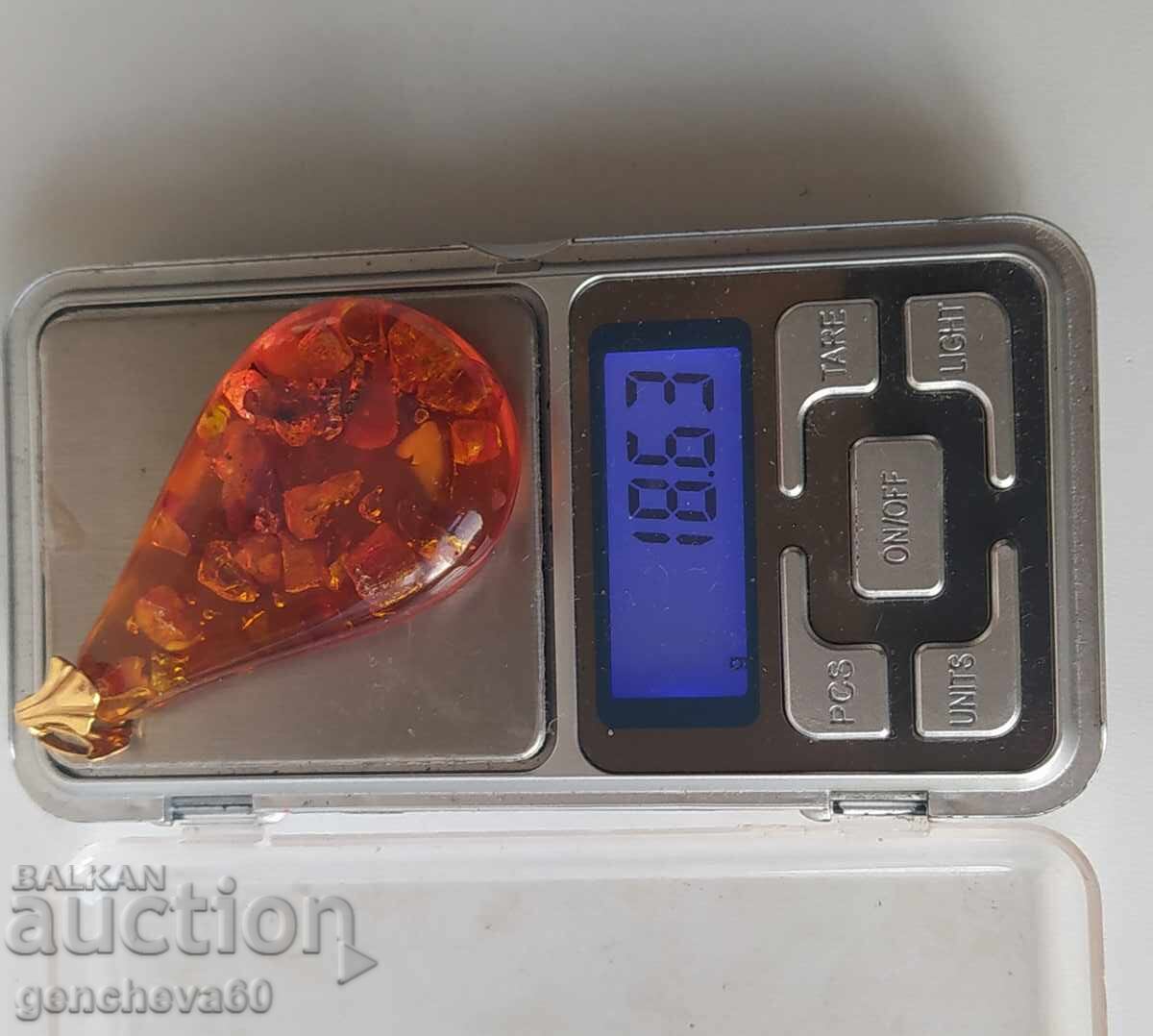 Livrarea Medalion pandantiv din chihlimbar natural Livrarea Medalion pandantiv din chihlimbar natural