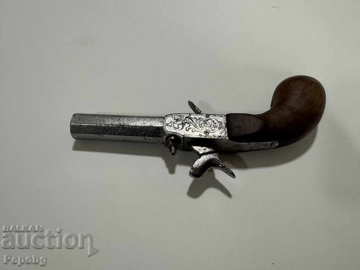 Παράδοση Παλιό πιστόλι κάψουλας, περίστροφο