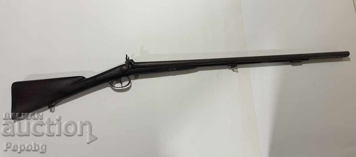 Old double-barreled capsule rifle Old double-barreled capsule rifle