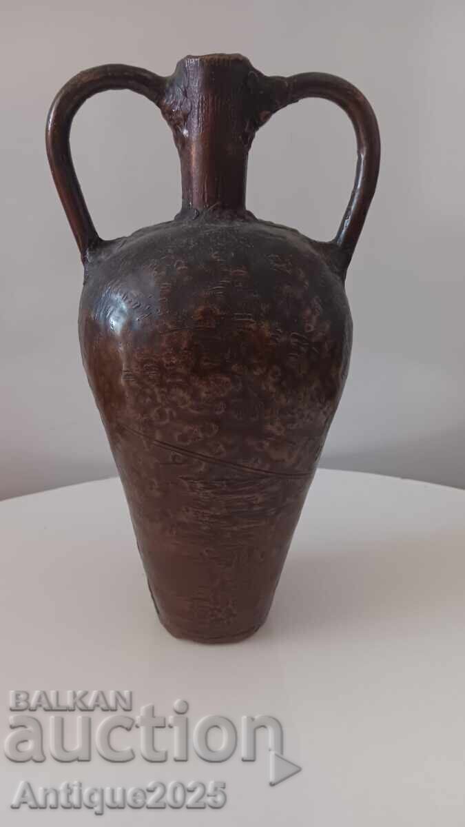 Auction  Antique amphora vase with relief putti, 18th century