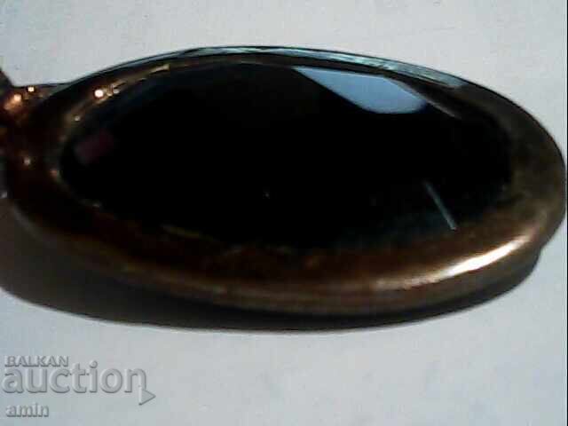 Auction  Old silver pendant with a large amethyst stone