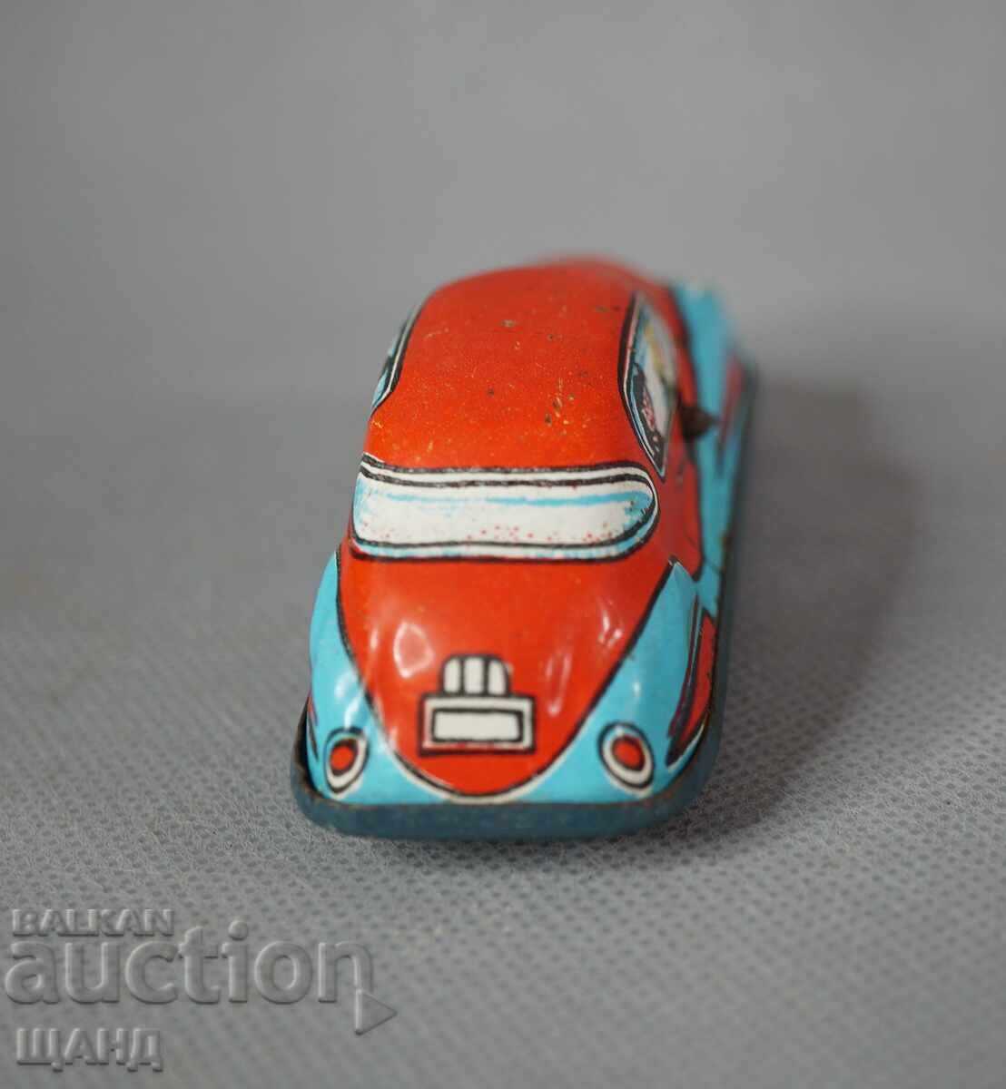 Livrarea Veche jucărie mecanică metalică model mașină de curse pentru pistă Livrarea Veche jucărie mecanică metalică model mașină de curse pentru pistă