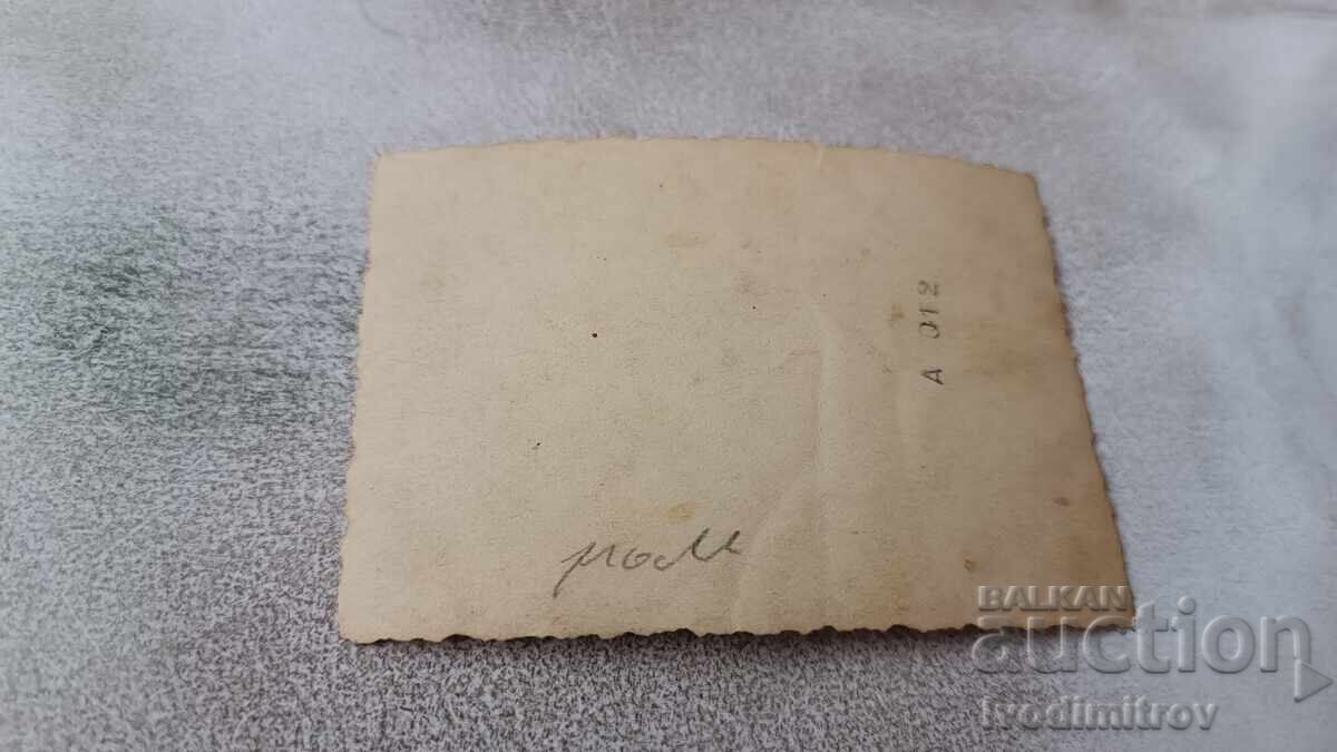 Photo of a woman in the yard of her house with price € 1.20 | 2.35 BGN