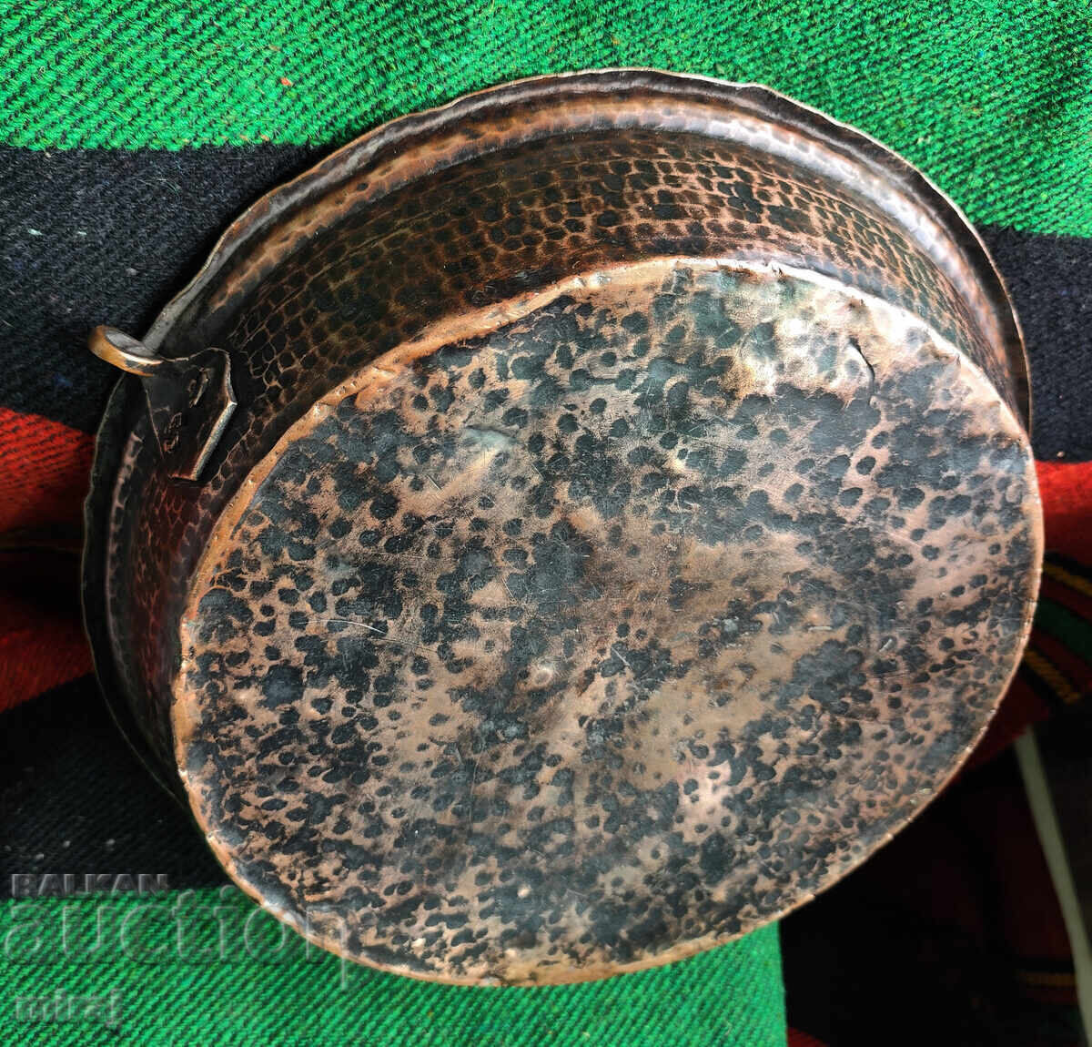 Auction  Renaissance-era fireplace pot made of wrought copper