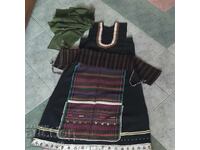 Authentic folk costume: sukman, sash, apron, and headscarf