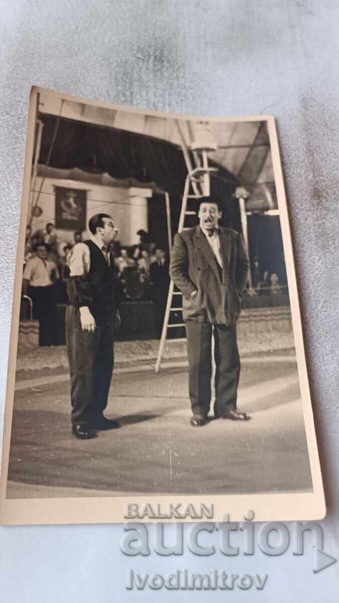 Photo of Two Clowns in a Circus Performance Photo of Two Clowns in a Circus Performance