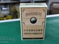 New sealed box of Chinese Huangchelou cigarettes