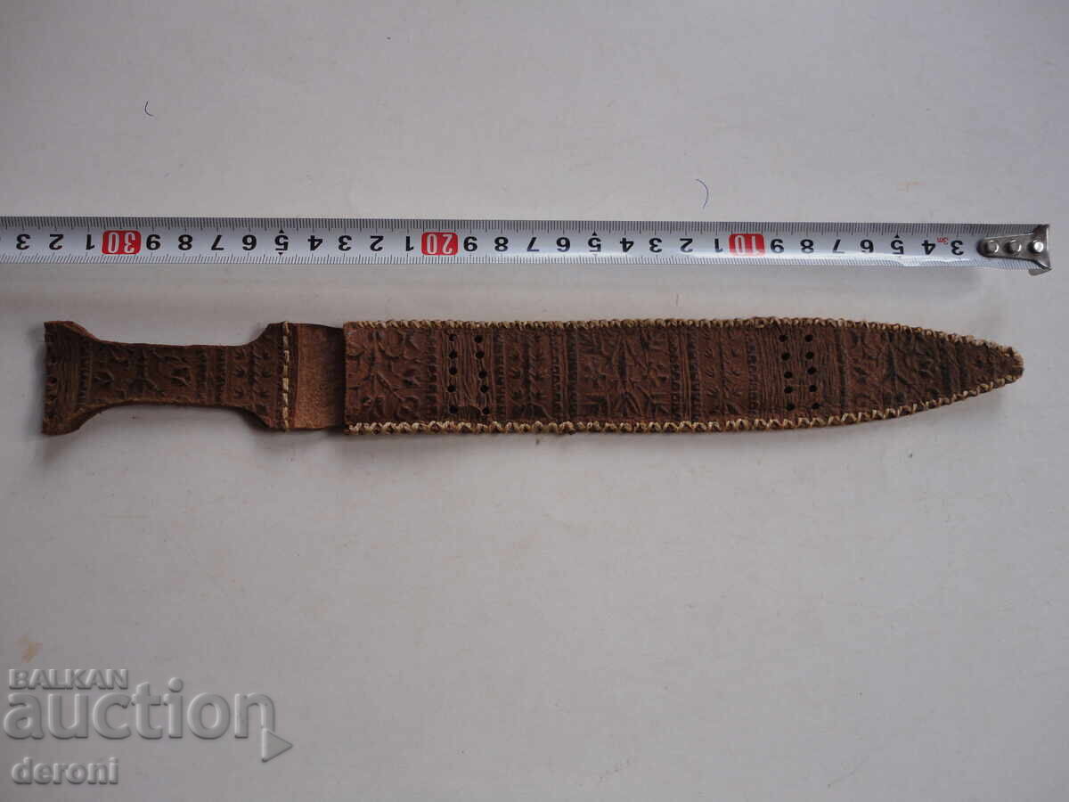 Leather sheath for a dagger Leather sheath for a dagger