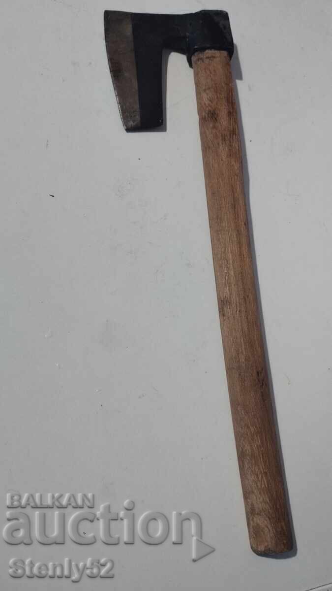 Auction Hatchet with a wooden handle Auction Hatchet with a wooden handle