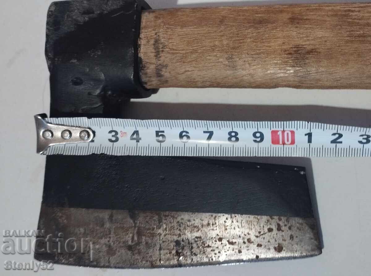 Hatchet with a wooden handle Hatchet with a wooden handle