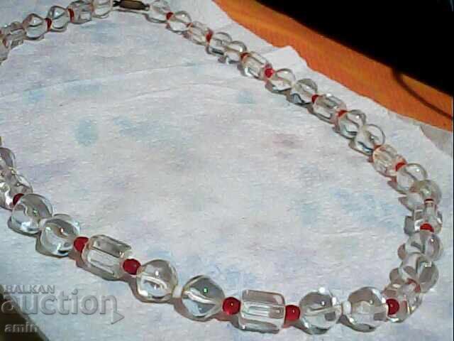 Beautiful quartz necklace with small ruby-type stones