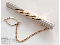 Νέα μανταλάκι, παραμάνα γραβάτας