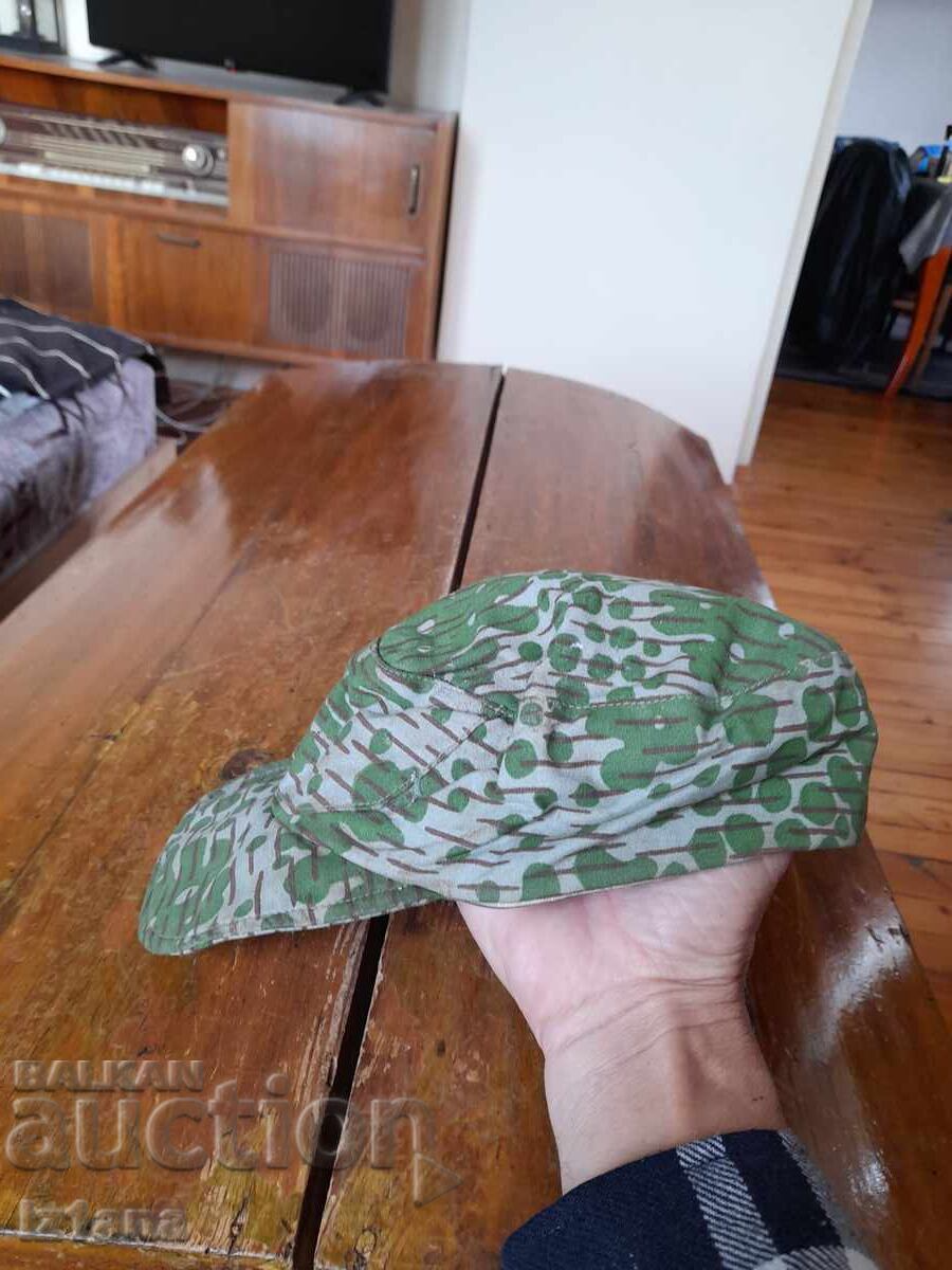 Παράδοση Καπέλο παραλλαγής, καμουφλάζ