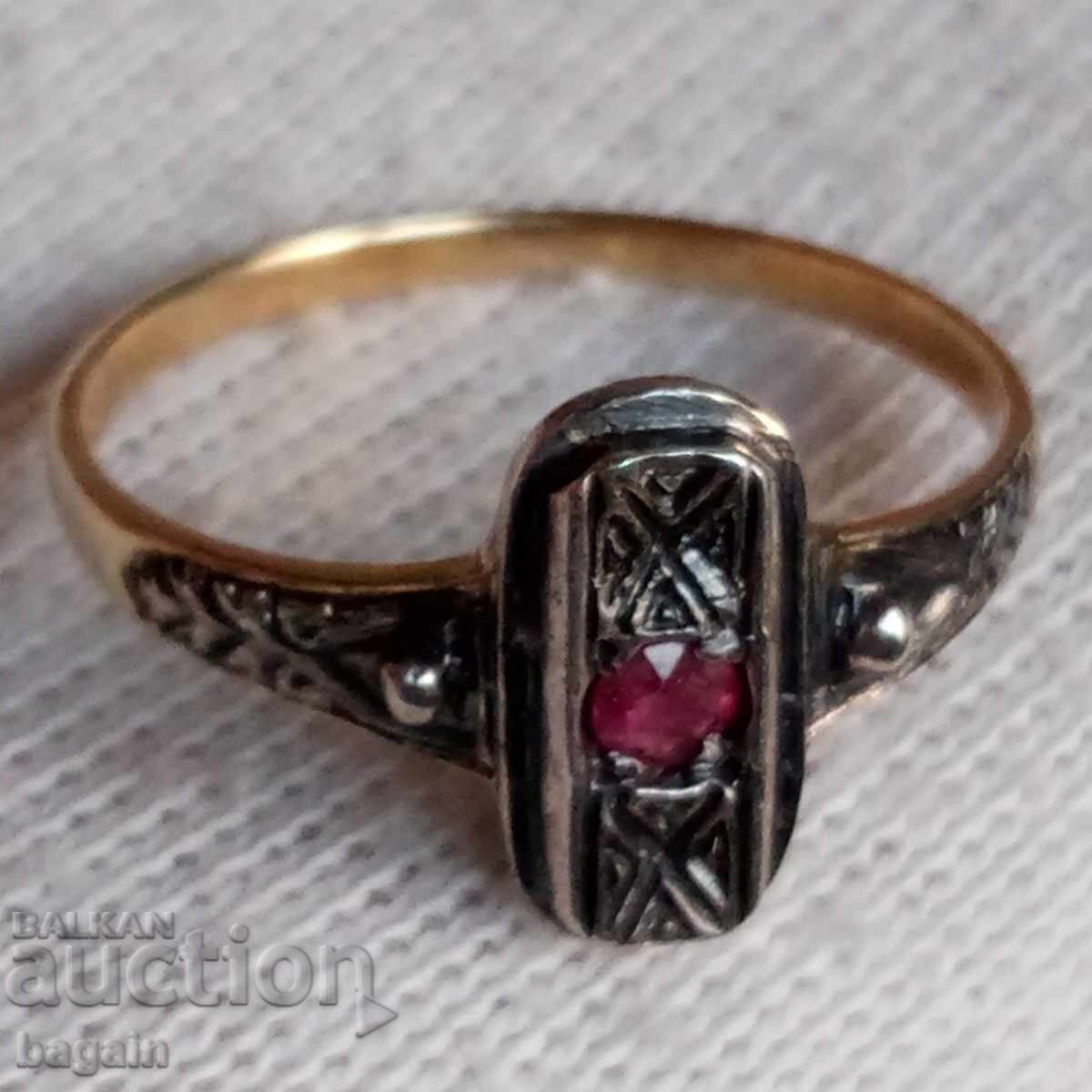 Silver ring with ruby and gold plating