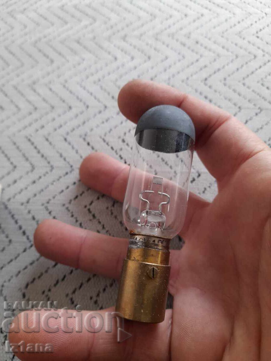 Auction  Old bulb, lamp for a movie projector