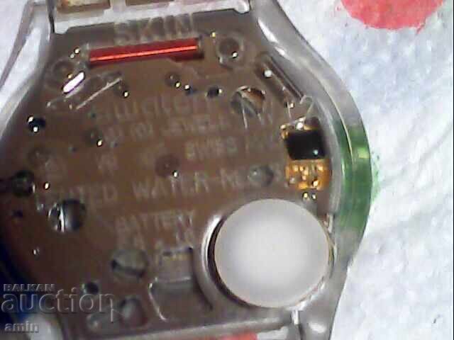 Auction  2pcs old ckin swatch working without battery