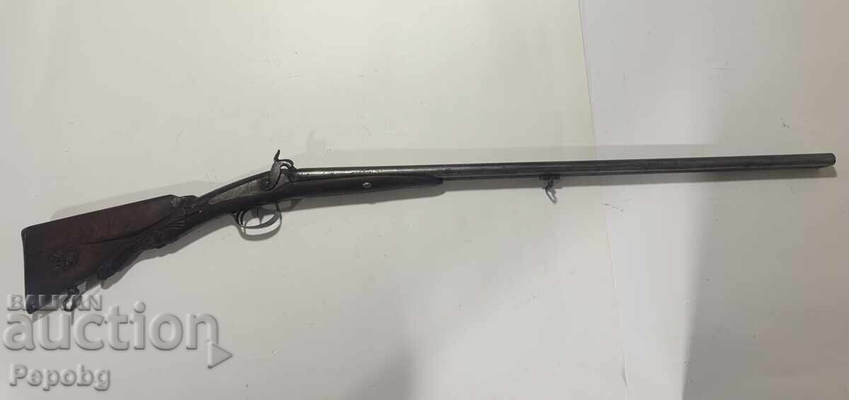 Veche pușcă capsulă