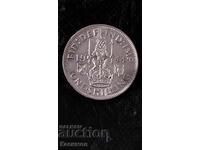 Old silver coin from Great Britain 1 Shilling 1944