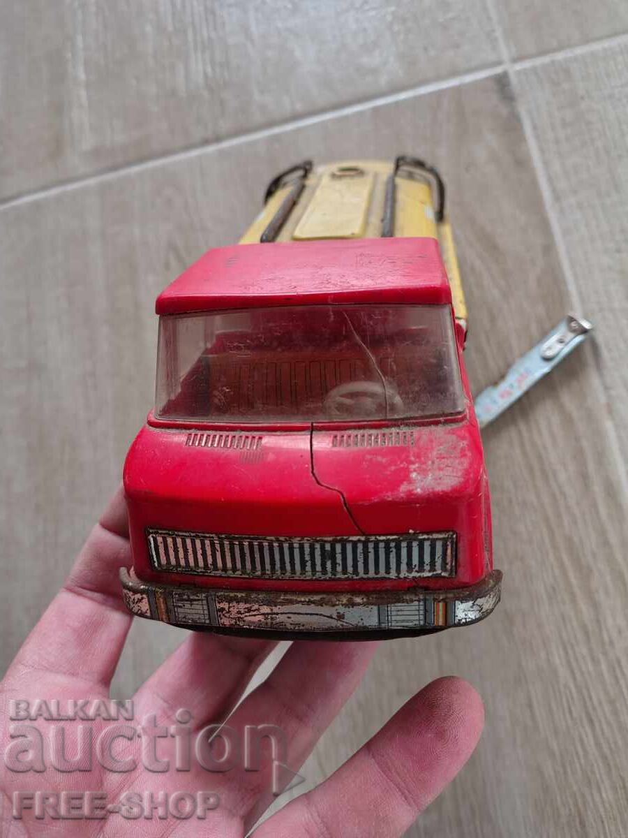 An old tin toy with price € 15.00 | 29.34 BGN An old tin toy with price € 15.00 | 29.34 BGN
