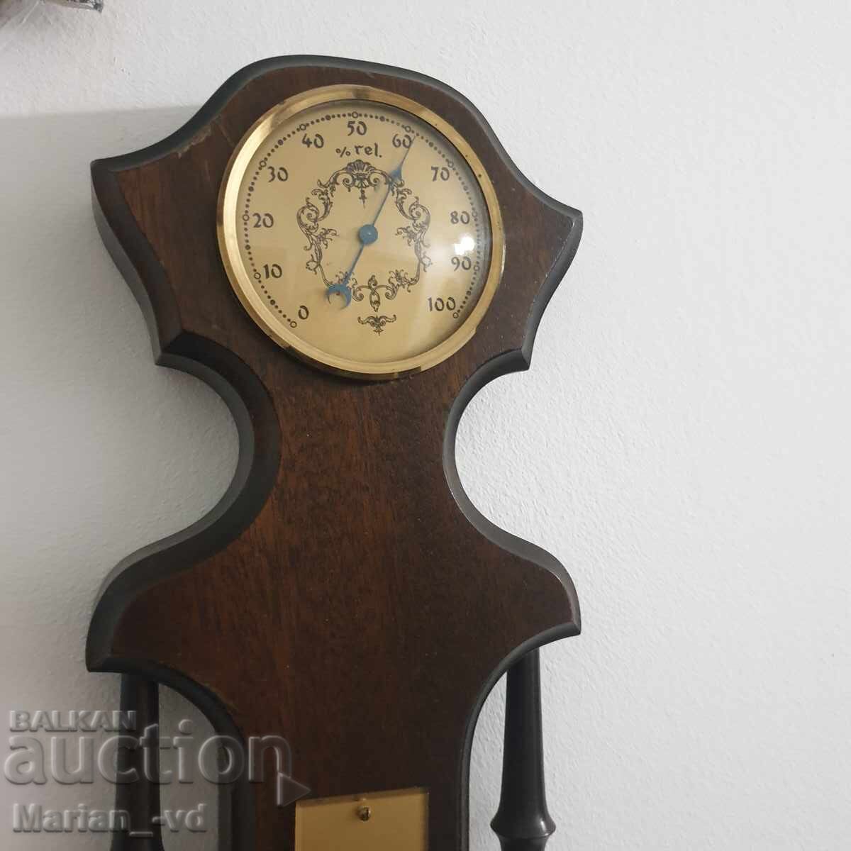 Delivery of Large barometer, thermometer, hygrometer and clock