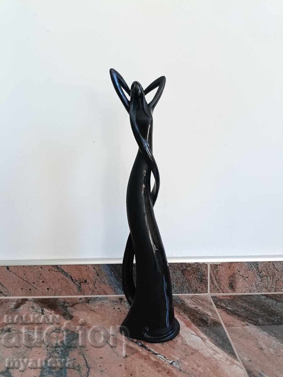 Livrarea Statuetă abstractă din porțelan a unei femei Livrarea Statuetă abstractă din porțelan a unei femei