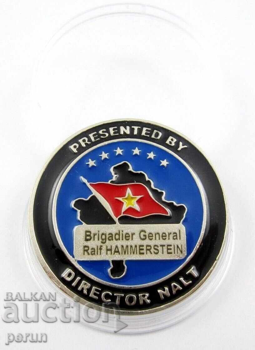 Placă - Echipă consultativă și de coordonare NATO în Kosovo